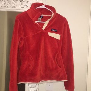 orange and cream Patagonia pullover